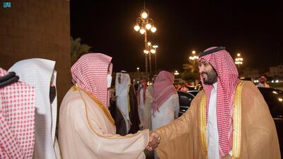 The Crown Prince (R) receives a warm welcome on arrival.