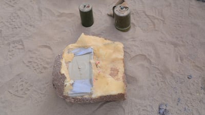 The explosives are hidden in fake rocks, making them hard to spot.