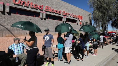 Hundreds of people queue to donate blood following the mass shooting in Las Vegas. REUTERS/Mike Blake