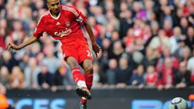 David Ngog scores Liverpool's second goal during the 2-0 victory over Manchester United.