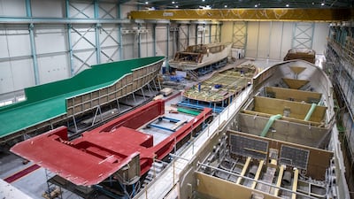 Green and red moulds inside the Gulf Craft boatyard in Umm Al Quwain.