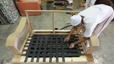 Inmates making furniture in the craft section in Al Aweer in Dubai. Pawan Singh / The National