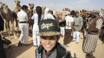 Jordanians race their camels in front of Sheikh Sultan bin Hamdan bin Zayed, President of the Arab Camel Racing Federation and with the presence of Prince Asem bin Nayef, vice president of the Jordan Royal Equestrian Federation, during the annual camel race in Wadi Rum, Jordan. Salah Malkawi / The National