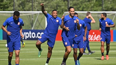 Virgil van Dijk and Steven Bergwijn during Netherlands' training session at Qatar Universty in Doha on November 24, 2022. The Dutch take on Ecuador in World Cup Group A on Friday. AFP