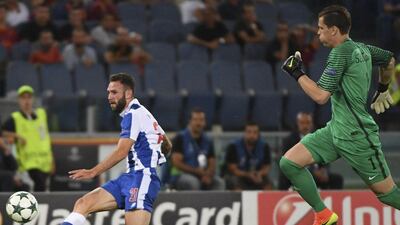 Porto’s Miguel Layun scored on this shot. Maurizio Brambatti / AP