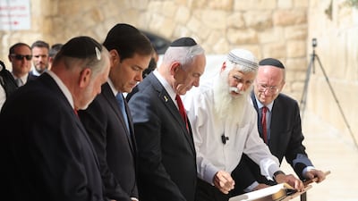US Secretary of State Marco Rubio, second from left, and Israeli Prime Minister Benjamin Netanyahu, third from left, visit the Western Wall in the Old City of Jerusalem, on Sunday. EPA