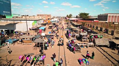 An outdoor market in Lusaka. Visitors can find all kinds of wares in the city’s numerous markets, including second-hand clothes. iStockphoto.com
