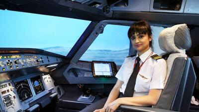 Air Arabia first officer Ghada Al Rousi in an Alpha Aviation Academy simulator. Pawan Singh / The National