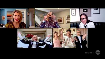 The cast of 'Schitt's Creek' accept the award for Outstanding Performance by an Ensemble in a Comedy Series during the 27th annual Sag Awards. AP