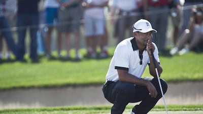 Tiger Woods was in the Champions Challenge on Tuesday and will play in his seventh Dubai Desert Classic starting Thursday. Antonie Robertson / The National