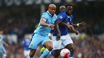 Vincent Kompany of Manchester City challenges for the ball with Romelu Lukaku of Everton during their Premier League contest on Sunday. Alex Livesey / Getty Images / August 23, 2015