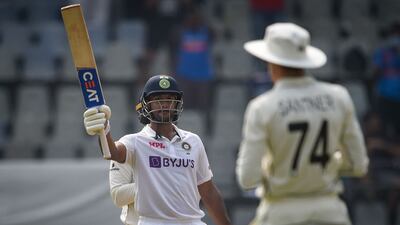 India's Mayank Agarwal celebrates after scoring 150 at the Wankhede Stadium in Mumbai. AFP