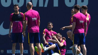 Barcelona’s players take part in a training session at the Sports Centre FC Barcelona Joan Gamper in Sant Joan Despi, near Barcelona on April 16, 2016, on the eve of the final of the Copa del Rey match between FC Barcelona and Sevilla FC. Lluis Gene / AFP