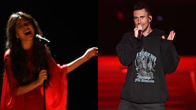 Singer Adam Levine, right, has showed support to Olivia Rodrigo amid song-copying allegations. Getty / AFP