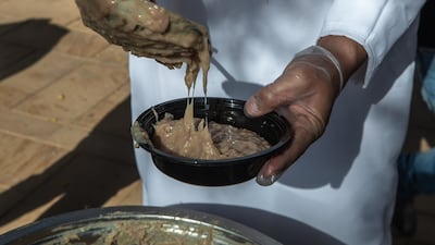 The dish is commonly made with wheat, chicken or lamb, spices, including cinnamon, water and butter, oil or ghee.