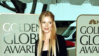 Gwyneth Paltrow, in a taffeta skirt and cardigan, attends the 56th annual Golden Globe Awards on January 24, 1999 in Beverly Hills, California. Getty Images