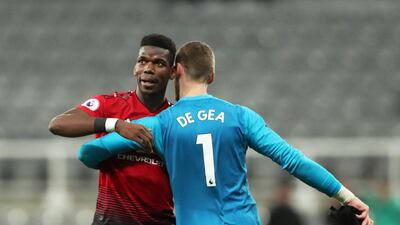 Paul Pogba celebrates with David de Gea at the end of the match. Reuters