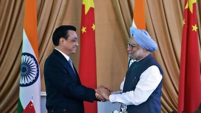 Mr Singh with China's then prime minister Li Keqiang in New Delhi, in 2013.
