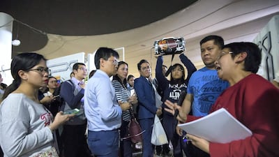 A church volunteer giving instructions to the crowd at St. Mary's Catholic Church. Leslie Pableo for The National
