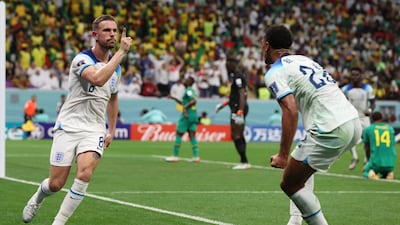 Jordan Henderson of England celebrates with teammate Jude Bellingham after scoring the opener. EPA