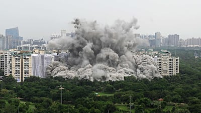 A controlled implosion brought the towers down after the Supreme Court ruled in favour of the residents. Photo: AFP