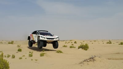 Sheikh Khalid Al Qassimi takes his Peugeot 3008 DKR for a test run ahead of the Abu Dhabi Desert Challenge. Courtesy Abu Dhabi Desert Challenge