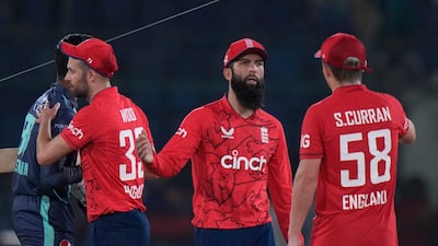 England's skipper Mooed Ali celebrates with teammates. AP