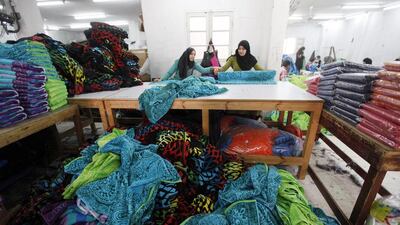 Striking workers suspended their labour action for 60 days after the Egyptian government promised to meet their demands. Mohamed Abd El Ghany / Reuters