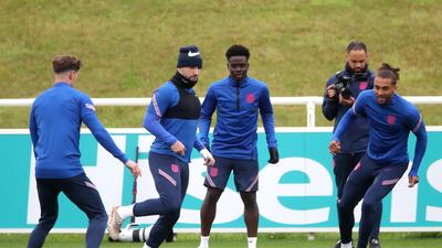 From second left: Luke Shaw, Bukayo Saka and Dominic Calvert-Lewin. PA