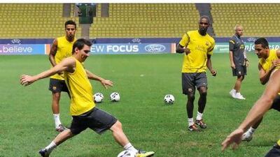Barcelona's players, training for last night's Uefa Super Cup against Porto, will start their Spanish season against Villarreal on Monday.