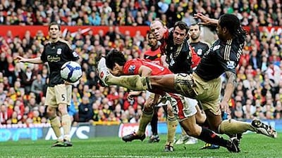 Ji-Sung Park, centre, stoops to head home the winner from Darren Fletcher's cross as Glen Johnson, right, challenges.