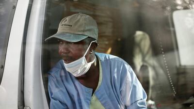 First responder Gordon Kamara waiting in the ambulance.