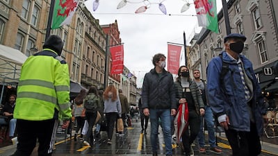 A view of a a busy street on the first weekend after Wales' 17-day fire-break lockdown in Cardiff. AP Photo