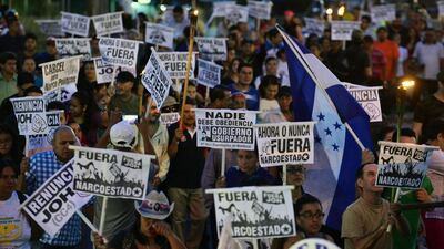 Supporters of the Libertad y Refundacion (LIBRE) opposition party demonstrate against Honduran President Juan Orlando Hernandez in Tegucigalpa. AFP