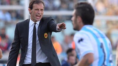 Former AC Milan coach Massimiliano Allegri was named as the new coach of Juventus on Wednesday, July 16, 2014. AFP PHOTO / VINCENZO PINTO