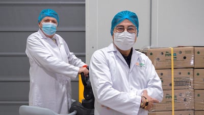 L-R: Adnan Peynirci, factory director, and Arda Cenk Tokbas, managing director of Hadaf Foods Industries. Victor Besa / The National