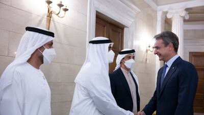 Sheikh Zayed bin Mohamed is greeted by Mr Mitsotakis during a reception at the Maximos Mansion, alongside Sheikh Mohammed bin Hamad, Adviser for Special Affairs at the Presidential Court (L), and Sheikh Mansour bin Zayed, Deputy Prime Minister and Minister of Presidential Affairs (3rd L).