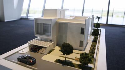 A model of golf villas offered by Al Zorah. Sarah Dea / The National