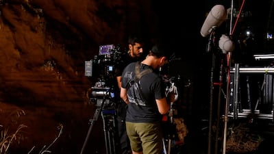 Camera operators set up during the filming of 'Jiu Jitsu'. AFP