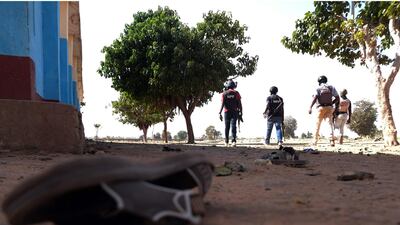 Police patrol the school. AFP