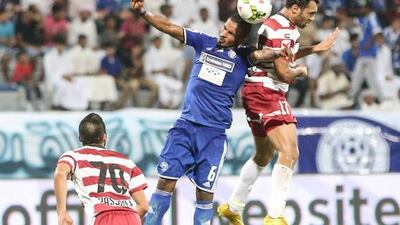 Mahmoud Khamis, centre, and Al Nasr were a head above Fujairah to climb within two points of league leaders Al Wahda. Omar Asker / Al Ittihad