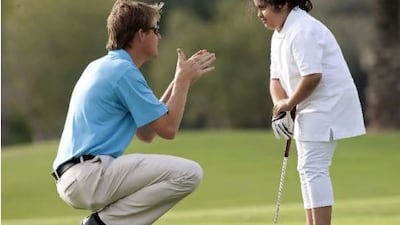 Jason Froggatt, left, one of two national coaches for the Emirates Golf Federation.