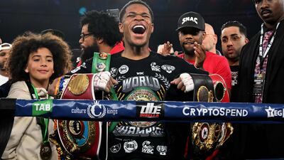 Devin Haney of the US celebrates after defeating Australia's George Kambosos in the lightweight unification title boxing bout to become the undisputed lightweight champion of the world in Melbourne on June 5, 2022. (Photo by William WEST / AFP) / -- IMAGE RESTRICTED TO EDITORIAL USE - STRICTLY NO COMMERCIAL USE --
