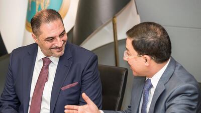 Ali Al Alaq (right), the Governor of the Central Bank of Iraq, with Faisal Al Haimus, Chairman of Trade Bank of Iraq. Antonie Robertson / The National