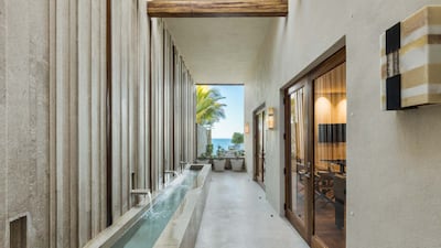 Water features frame the long and spacious corridors.