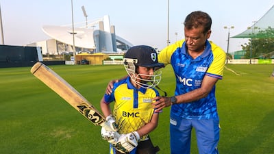 Coach Sandeep Dhuri coaching young cricketers at Zayed Cricket Academy.
