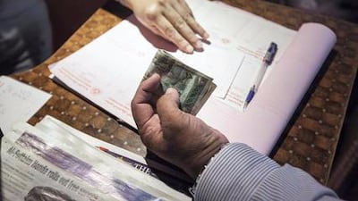 New Chinese restrictions on moving foreign currency out of the country as well as overseas property buys have citizens transferring money in other ways. Antonie Robertson / The National