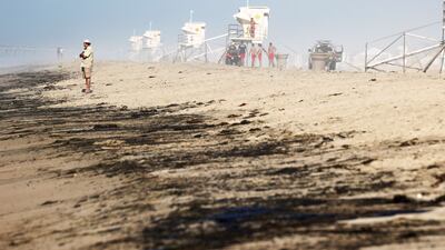 Oil washed up on Huntington State Beach after 573,000 litres spilled from an offshore platform on Sunday in California. Photo: AFP