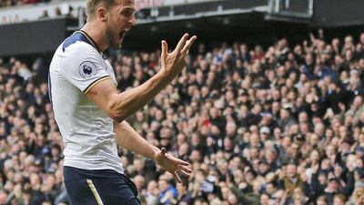 Tottenham Hotspur's Harry Kane celebrates after scoring his side's second goal during the English Premier League soccer match between Tottenham Hotspur and Stoke City at White Hart Lane. AP Photo/Frank Augstein