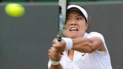 A little down time almost cost sixth-seeded Li Na, but she pulled out the victory Thursday. Gerry Penny / EPA